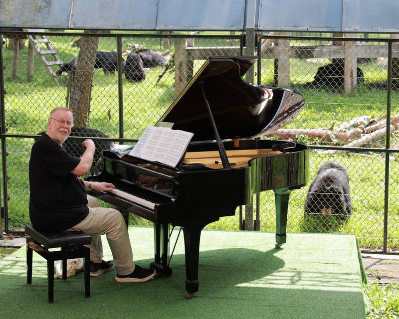 Rick Wakeman Plays Piano for 150 Rescued Moon Bears in Vietnam