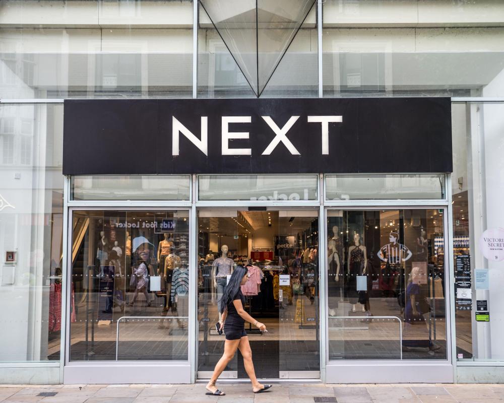 Next Raises Profit Forecasts After Hot Weather Boosts Sales