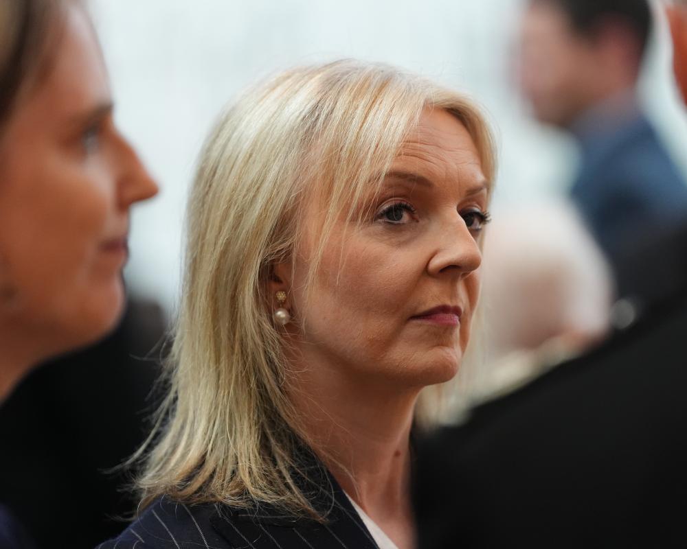 Liz Truss Unites Britain in Mockery With New Book Bank Job