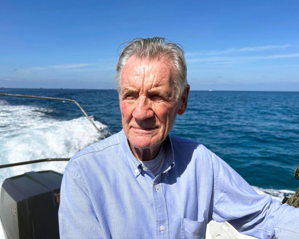 Michael Palin Exposes Recycled Chicken in Philippines TV Show