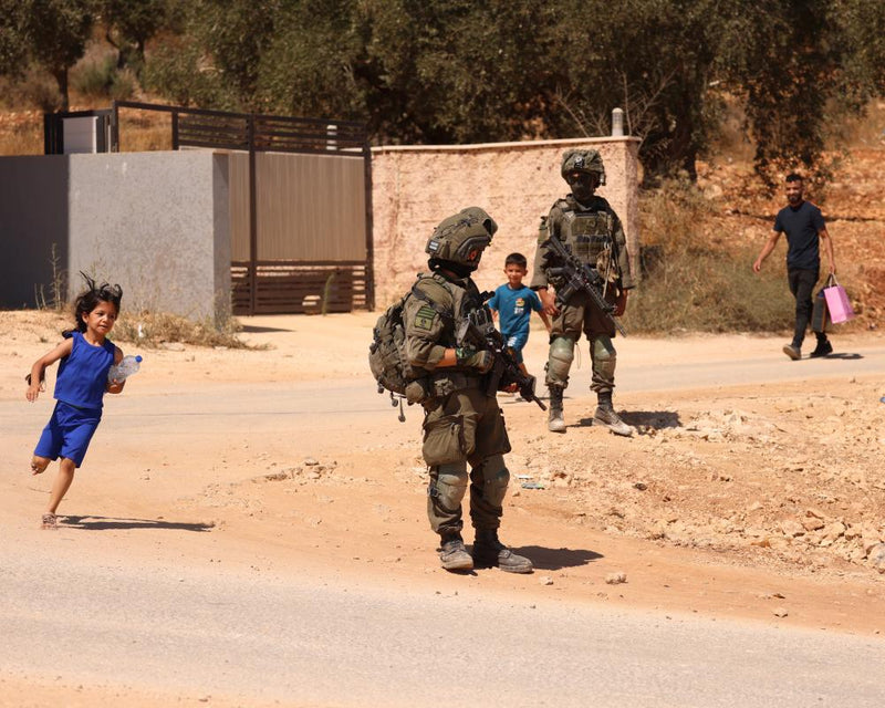 Israeli Troops Force West Bank Families From Homes Amid Settler