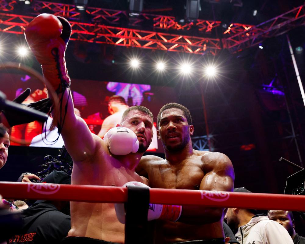 Anthony Joshua Knocked Down Twice, Stops Prenga in Second Round