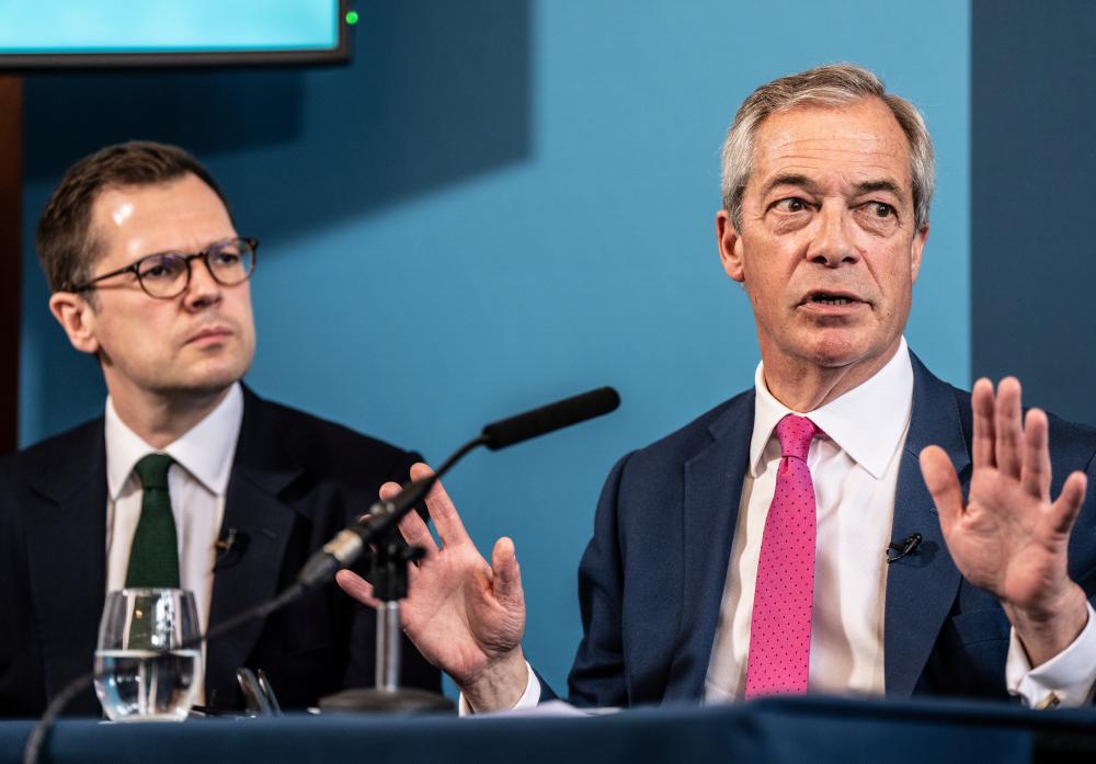 Jenrick Defends Farage Against Racism Allegations in Reform UK