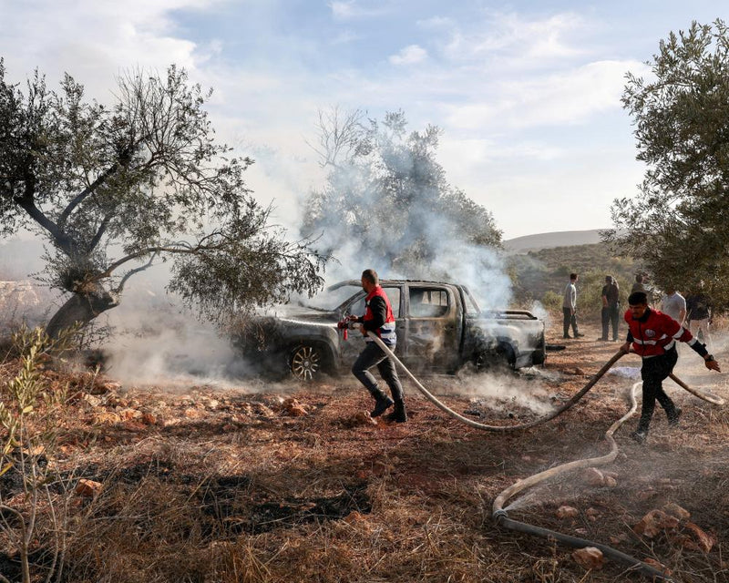Israeli Settlers Attack Olive Farmers and Journalist in West Bank