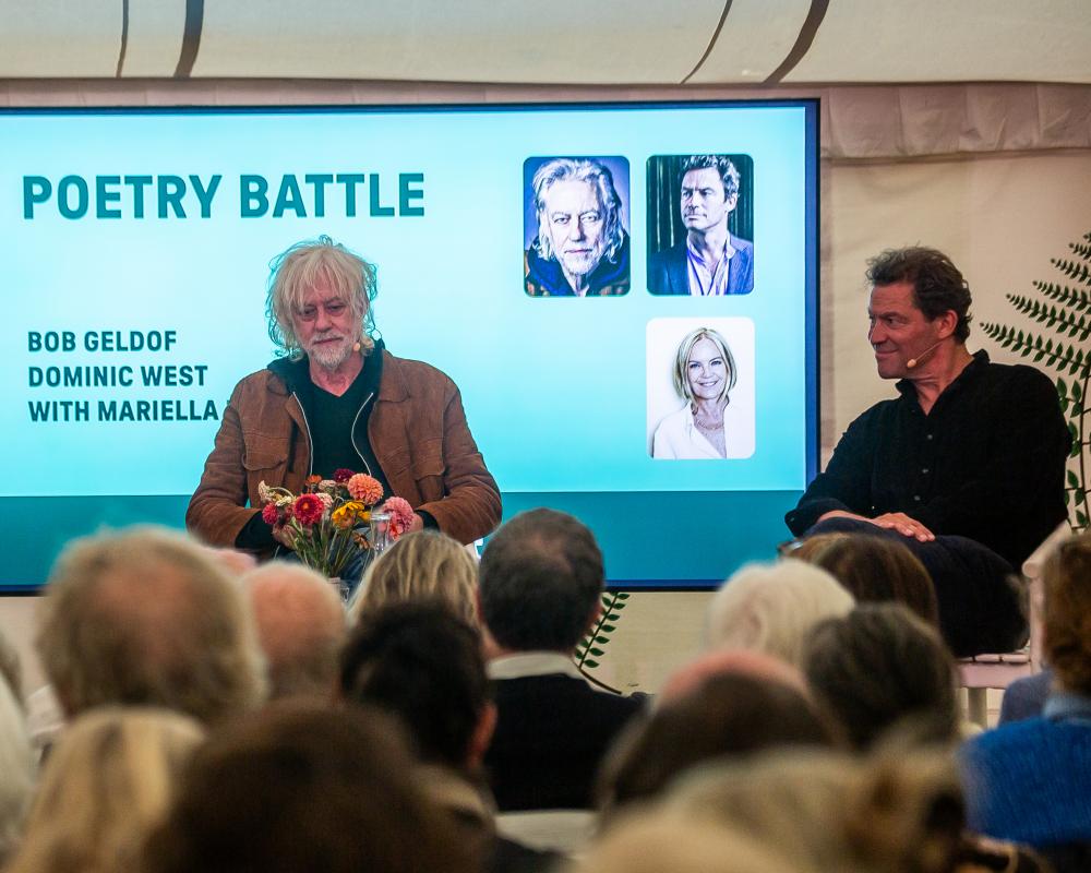 Dominic West Backs Byron as Top Poet in Battle With Geldof