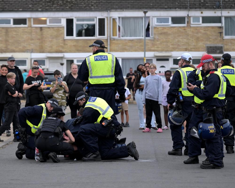 Norfolk Police Arrest Two Men After Officer Injuries in Asylum