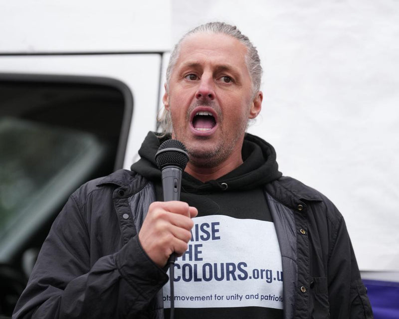 Flag Group Leader Faces 14 Charges in England