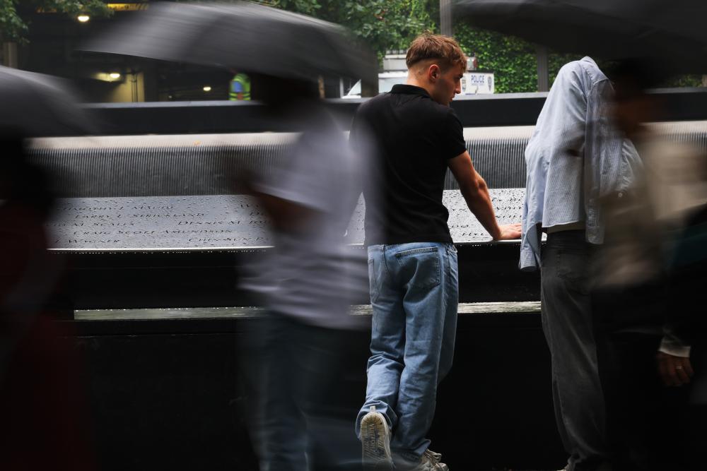 Ground Zero Visitors Reflect on 9/11 Lives Lost at Memorial