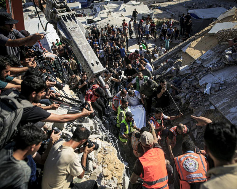 Gaza City Building Collapse Kills 16 Amid Israeli Strikes