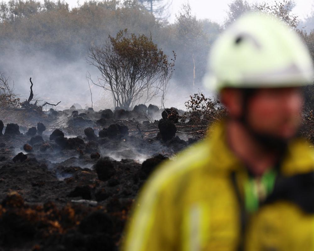Belgian Wildfire: Firefighters Battle Largest Blaze in Century