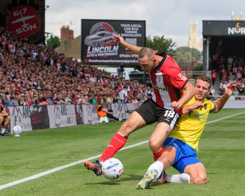 Lincoln City's Championship Return Brings Optimism Despite Defeat