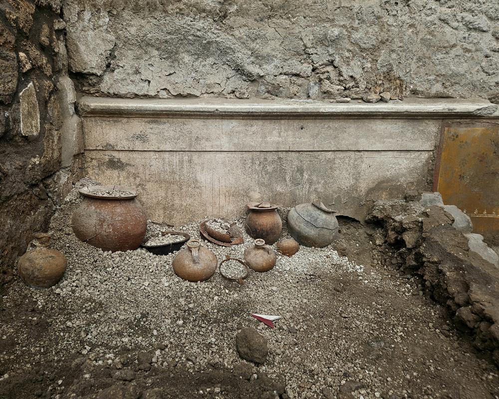 Pompeii Wardrobe Yields Perfume Bottle and Child's Necklace
