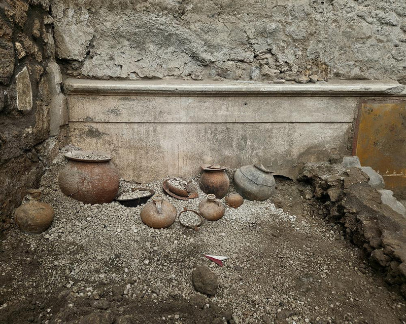 Pompeii Wardrobe Yields Perfume Bottle and Child's Necklace