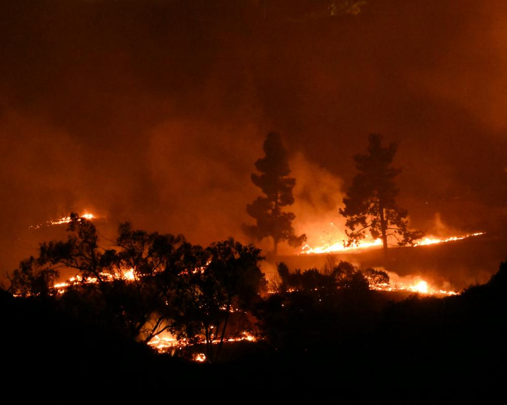 California Brush Fires Trigger Evacuations and Power Shutoffs