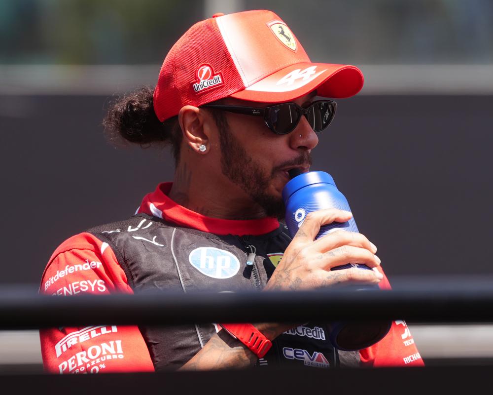 Lewis Hamilton Blasts Ferrari After Costly Penalty in F1 Title