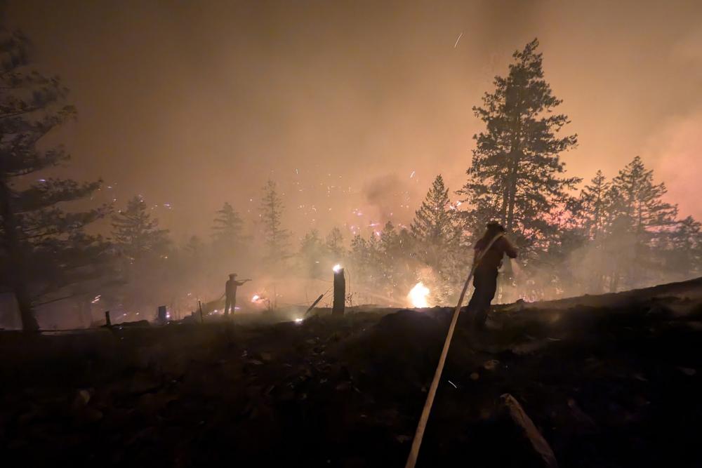Canada Wildfires Force 22,000 to Flee: Federal Aid Deployed