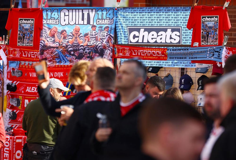 Manchester City's Anfield Welcome: Tension, Cheat Banners, Inflatable
