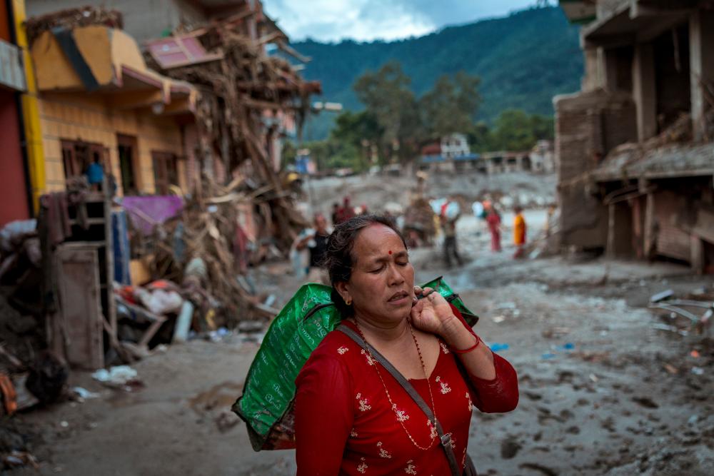 Nepal-Tibet Flood Death Toll Rises to 750 with Rescue Race