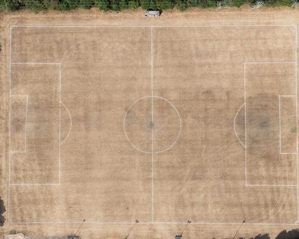 Rock Hard Pitches Force Football Season Postponement