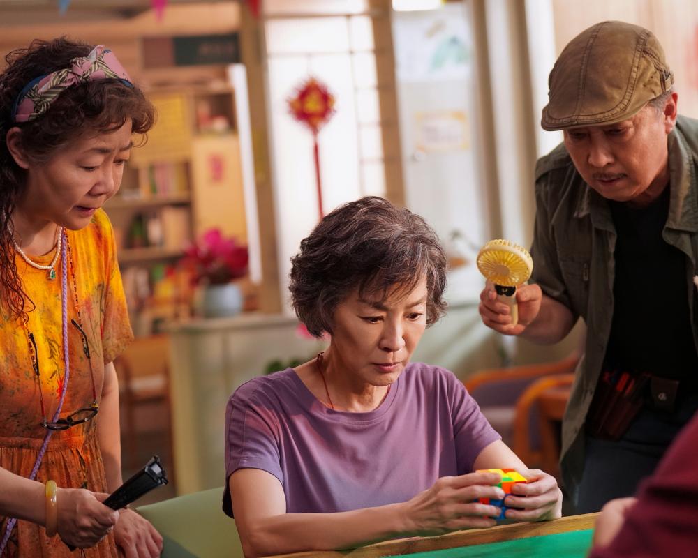 Michelle Yeoh Shines in 'It's My Time' Rubik's Cube Drama