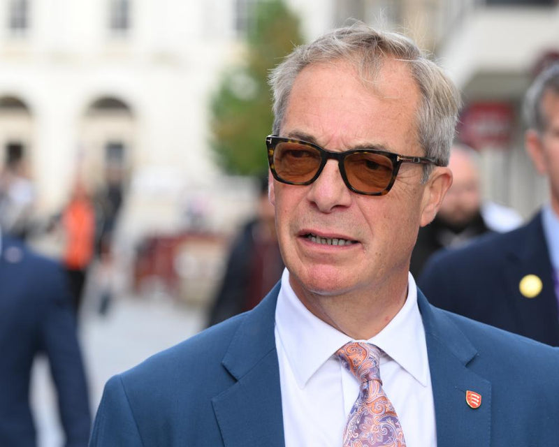 Farage Accused of Protecting Reform Candidate Over Racist Slurs