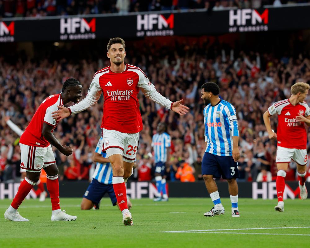 Arsenal Crush Coventry to Launch Premier League Title Defence