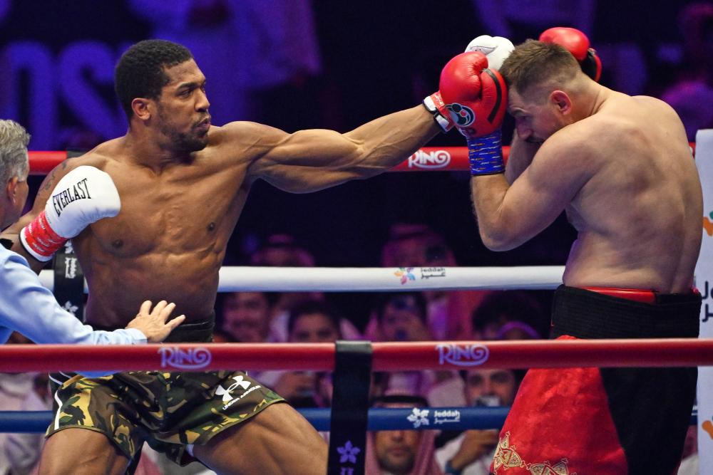 Anthony Joshua's Knockdowns Raise Questions Ahead of Fury Fight