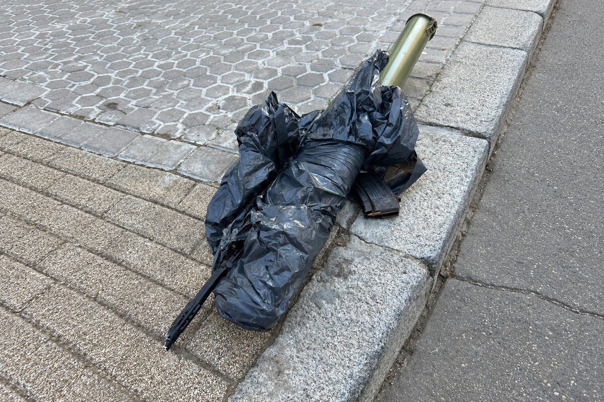 Seville Police Hunt Suspect After Assault Rifle Found in Trash