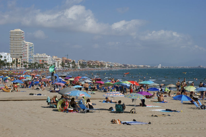 Barcelona Beaches Overrun by Tourists Sleeping on Sand