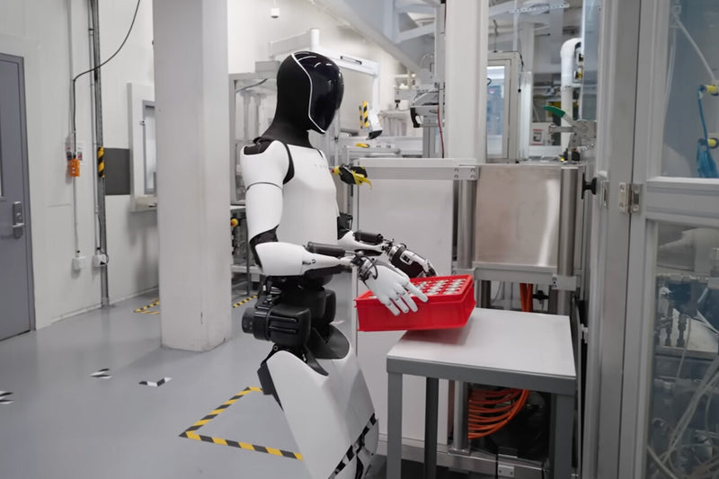 Tesla Optimus: Workers Train Robots That May Replace Them