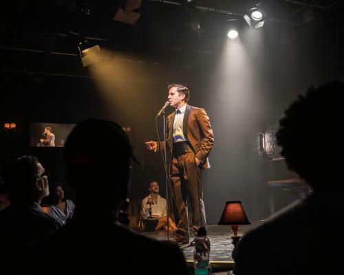 Midnight at the Never Get Review: Ben Platt Shines in 60s...