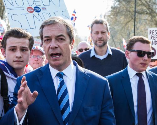 Nigel Farage admits fraudster friend paid for filming, used his h