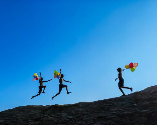 Monojit Dutta Captures Joy of Children Playing Under Open Sky in Awa - grandgoldman.com