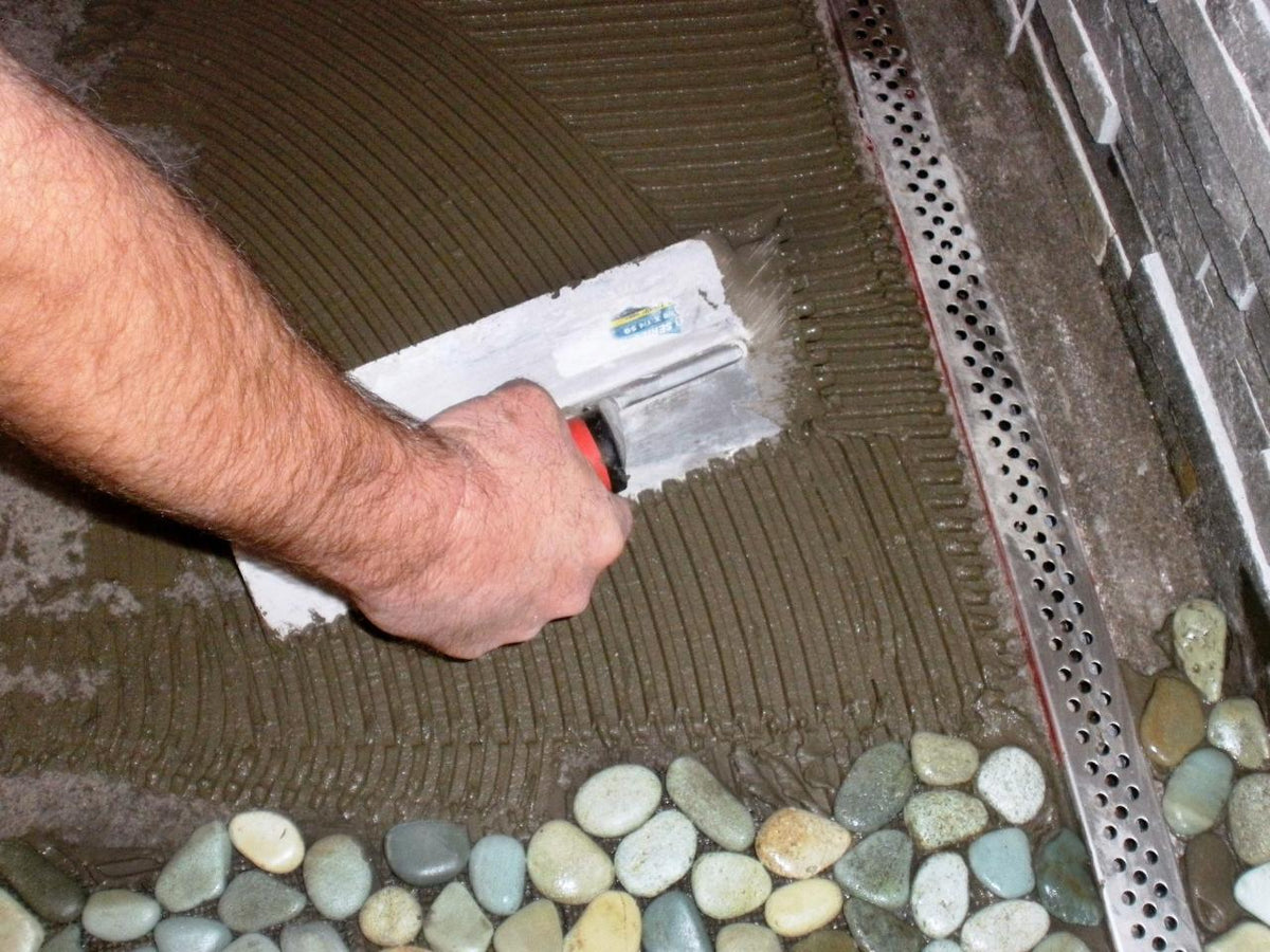 Create Your Own Stone Shower Floor! - grandgoldman.com