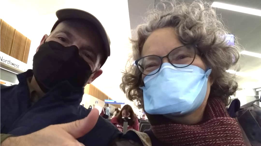 Can you ask the person sitting next to you to put on a mask if you are coughing on an airplane?