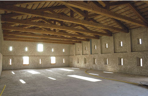 Eclisse Sliding Door Systems for Restoring a 16th-Century Mill