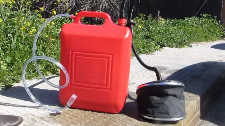 Make a Portable Outdoor Shower with a Gallon Container - grandgoldman.com