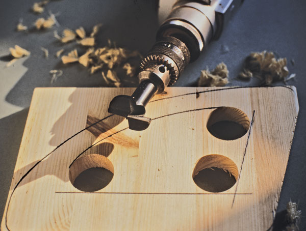 How to Drill Large Holes in Wood: Tools & Techniques