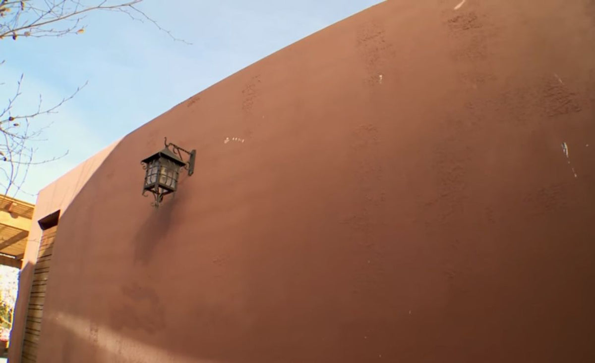 Cover an external wall with stone and give it functionality - grandgoldman.com