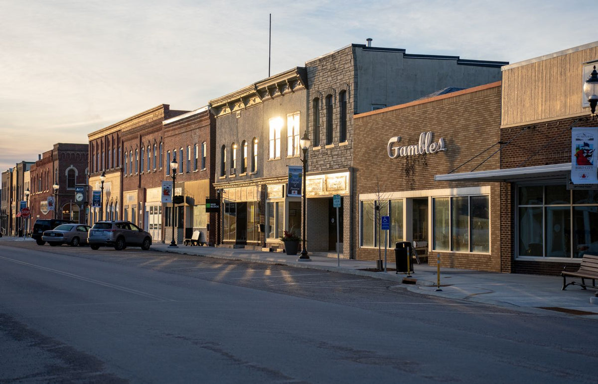 Quaint historic downtown Wabasha, Minnesota, at sunset with charming storefronts.