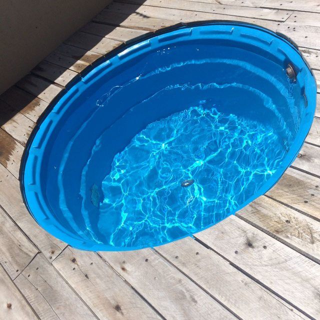 How to make a homemade pool with a water container and pallets - grandgoldman.com