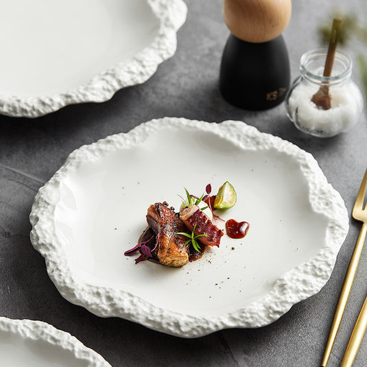 Assiette en céramique à motif de pierre gaufrée de style européen pour restaurant d'hôtel