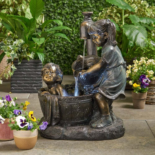 Statue de jardin garçon et fille Statue de jardin garçon et fille