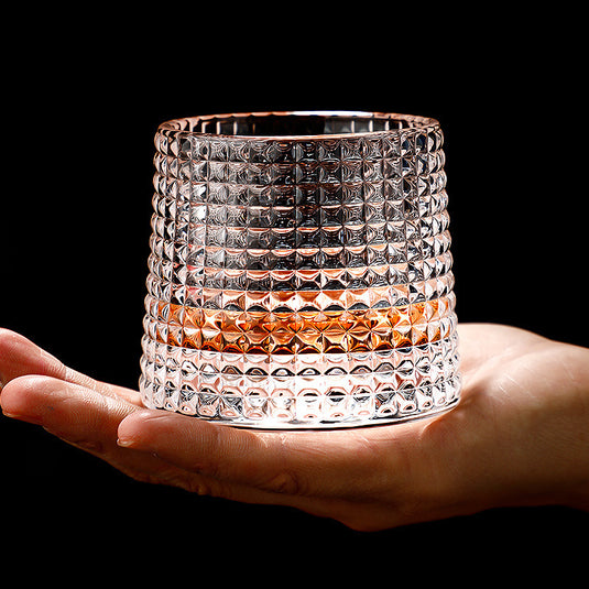 Fortykket roterende tumbler whiskyglas
