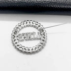 Exquisite green rhinestone inlaid round LINKS letter metal brooch the links incorporated society jewelry pin