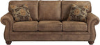 Signature Design by Ashley Larkinhurst Faux Leather Sofa with Nailhead Trim and 2 Accent Pillows, Brown