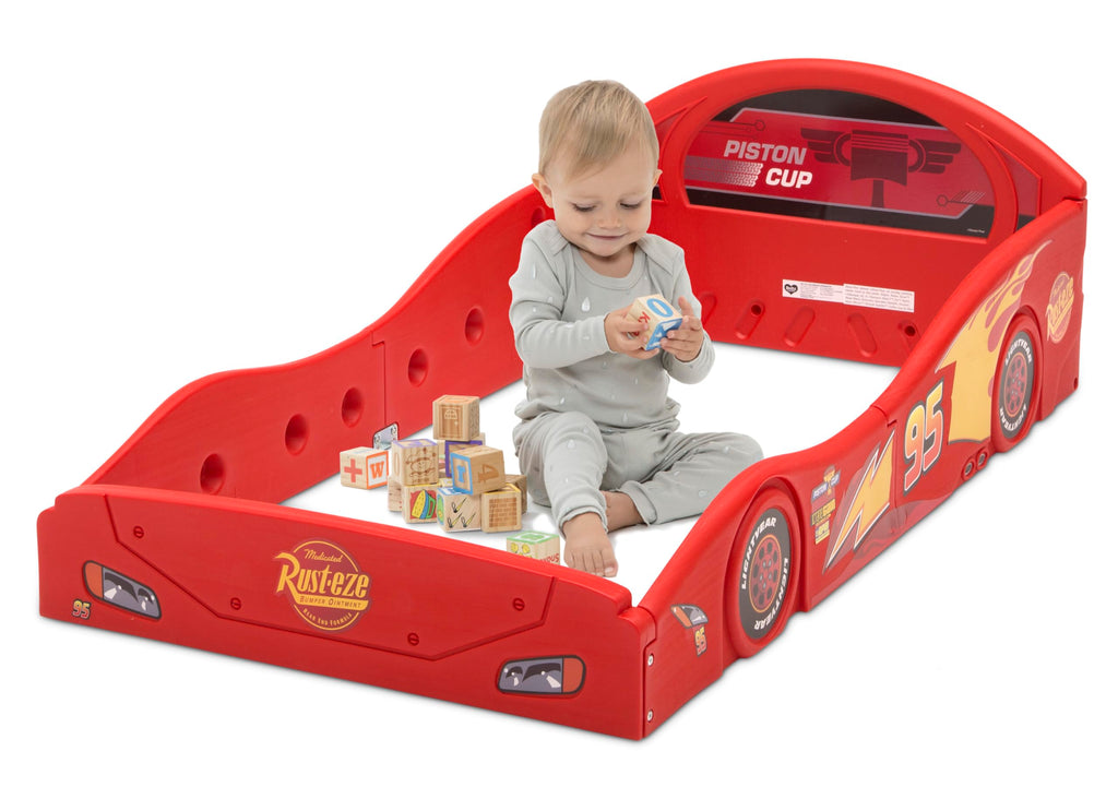 Delta Children Disney Pixar Cars Lightning McQueen Race Car Sleep and Play Toddler Bed with Attached Guardrails