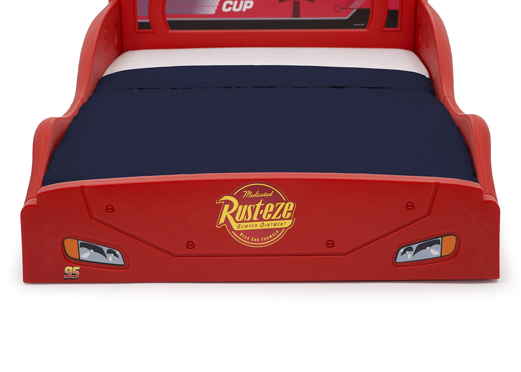 Delta Children Disney Pixar Cars Lightning McQueen Race Car Sleep and Play Toddler Bed with Attached Guardrails