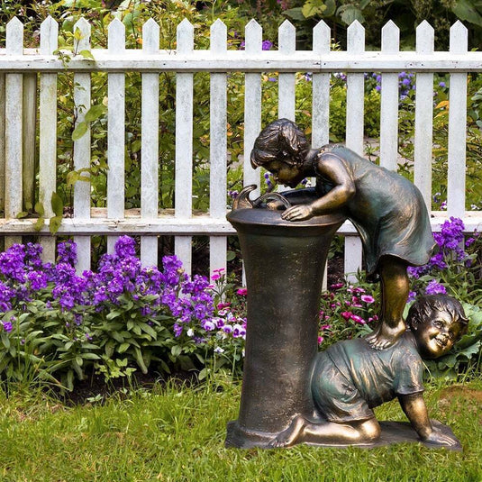 Statue de jardin garçon et fille Statue de jardin garçon et fille