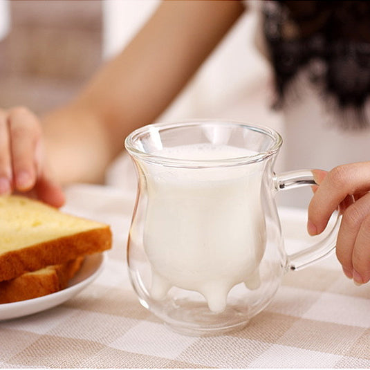 Jolie tasse à lait en double verre